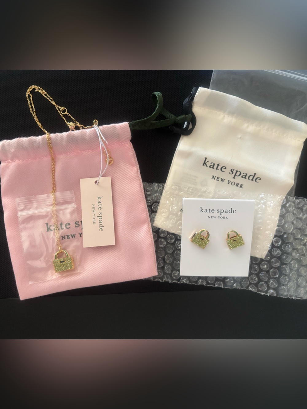 kate spade Gold-tone Necklace with Light Green Crystal Purse Charm